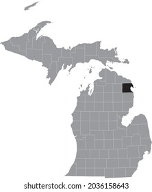 Black highlighted location map of the Alpena County inside gray map of the Federal State of Michigan, USA