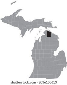 Black highlighted location map of the Cheboygan County inside gray map of the Federal State of Michigan, USA