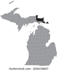 Black highlighted location map of the Chippewa County inside gray map of the Federal State of Michigan, USA