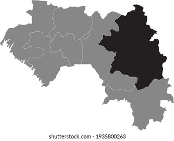 Black highlighted location map of the Guinean Kankan region inside gray map of the Republic of Guinea