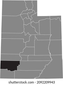 Black highlighted location map of the Iron County inside gray administrative map of the Federal State of Utah, USA