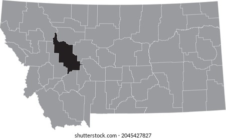 Black highlighted location map of the Lewis and Clark County inside gray map of the Federal State of Montana, USA