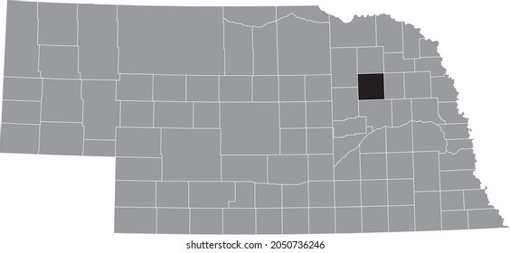 Black highlighted location map of the Madison County inside gray map of the Federal State of Nebraska, USA