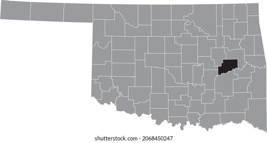 Black highlighted location map of the McIntosh County inside gray administrative map of the Federal State of Oklahoma, USA