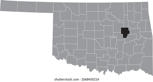Black highlighted location map of the Okmulgee County inside gray administrative map of the Federal State of Oklahoma, USA
