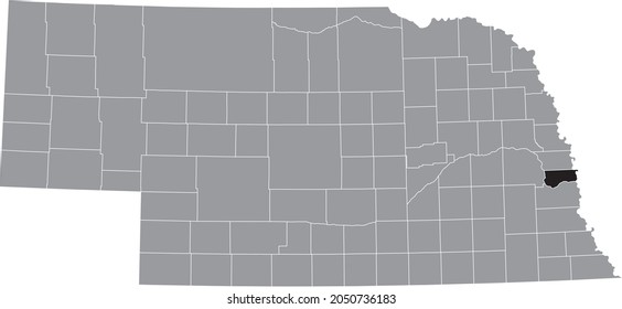 Black highlighted location map of the Sarpy County inside gray map of the Federal State of Nebraska, USA