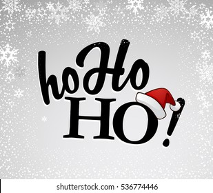 Black Ho-ho-ho! text with Santa's red hat on silver background and many snow flakes.