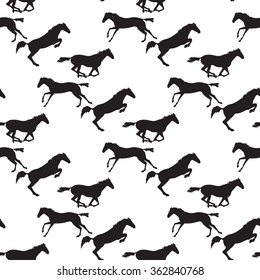 Black horse seamless pattern on isolated background. Background with Equine sports theme. Running and jumping herd of horses.  seamless pattern with horses