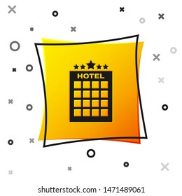 Black Hotel building icon isolated on white background. Yellow square button. Vector Illustration