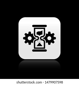 Black Hourglass and gear icon isolated on black background. Time Management symbol. Clock and gear icon. Business concept. square button. Vector Illustration