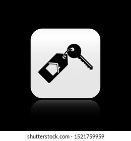 Black House with key icon isolated on black background. The concept of the house turnkey. Silver square button. Vector Illustration