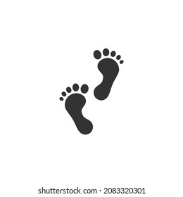 Black human feet and foot step. Bare footprints. Footstep shape silhouette. Sand or paint trace. Vector illustration isolated on white. 