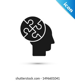 Black Human head puzzles strategy icon isolated on white background. Thinking brain sign. Symbol work of brain.  Vector Illustration