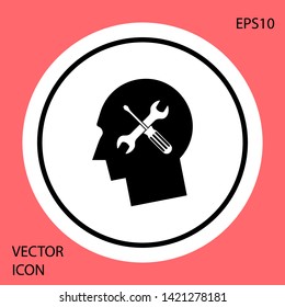 Black Human head with with screwdriver and wrench icon isolated on red background. Artificial intelligence. Symbol work of brain. White circle button. Vector Illustration