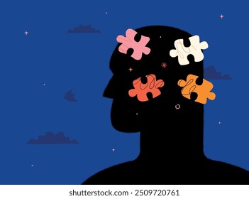 A black human profile with colorful puzzles inside. The concept of imagination, creativity, and the search for new ideas.