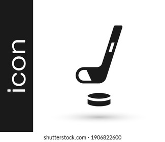 Black Ice hockey stick and puck icon isolated on white background.  Vector