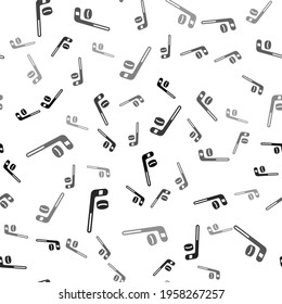 Black Ice hockey stick and puck icon isolated seamless pattern on white background.  Vector