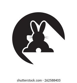 black icon with back Easter bunny and white stylized shadow