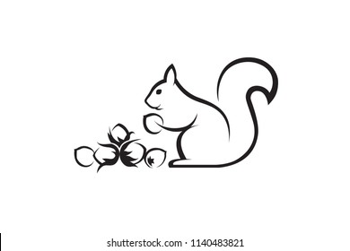 black icon of squirrel with nuts on white background