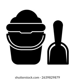 Black illustration of a bucket filled with sand and a shovel for digging in the sand. This image is suitable for use as a graphic element in designs related to the beach or childhood.