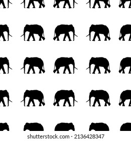 Black indian elephant silhouette isolated on white vector seamless pattern design. Wildlife elefant with tusks and trunk.  Elephant silhouette endless pattern.