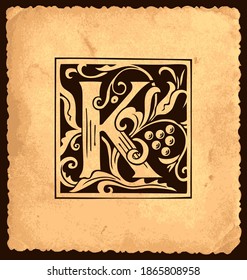 Letra negra inicial K con decoraciones barrocas sobre un fondo de papel antiguo de estilo vintage. Hermosa letra mayúscula de filigree apta para tarjeta de saludo, invitación, monograma, logotipo, emblema