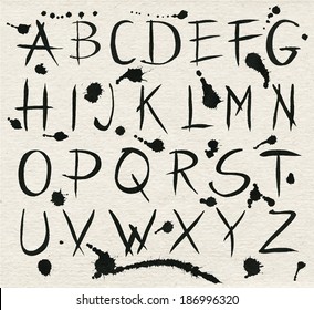 Black ink alphabet letters with splashes. Vector symbols