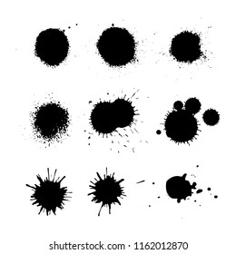 Black ink blots isolated on white background. Splashes texture. Vector EPS 10.