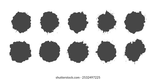 Black ink blots on a white background