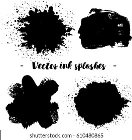Black ink splashes isolated on background. Vector illustration. Design elements or grunge background.