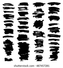 Black ink spots isolated on a white background. Vector illustration. Design elements or grunge background. Set of black grunge splash banners.