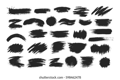 Black ink spots set on white background. Ink illustration. Brush strokes set.