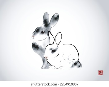 Black ink wash painting of rabbits on white background.Traditional oriental ink painting sumi-e, u-sin, go-hua. Translation of hieroglyph - well-being.