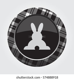 black isolated button with gray, black and white tartan pattern on the border - light gray happy rabbit - rear view icon in front of a gray background