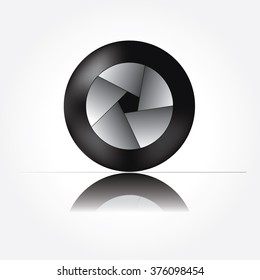 black isolated camera shutter icon with shadow and grey gradient background