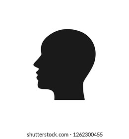 Black isolated icon of head on white background. Silhouette of head. Flat design. Profile.