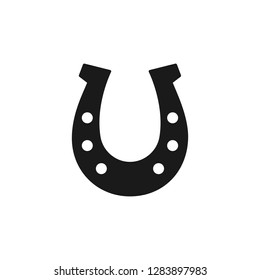 Black isolated icon of horseshoe on white background. Silhouette of horseshoe. Flat design. Symbol of luck.