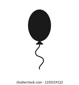 Black isolated icon of oval balloon on white background. Silhouette of balloon. Flat design.