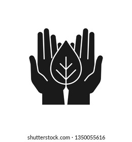 Black isolated icon of plant in hands on white background. Silhouette of leaf and hands. Symbol of care, protection, charity.