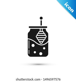 Black Jar of honey and honey dipper stick icon isolated on white background. Food bank. Sweet natural food symbol. Honey ladle.  Vector Illustration