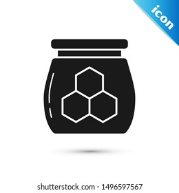 Black Jar of honey icon isolated on white background. Food bank. Sweet natural food symbol.  Vector Illustration