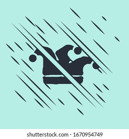 Black Joker playing card icon isolated on green background. Jester hat with bells. Casino gambling. Glitch style. Vector Illustration