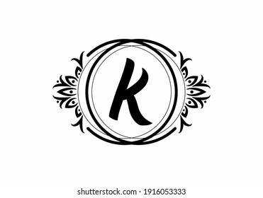 Black K initial letter in classic frame