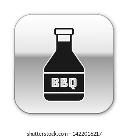 Black Ketchup bottle icon isolated on white background. Barbecue and BBQ grill symbol. Silver square button. Vector Illustration