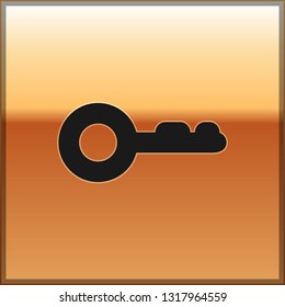 Black Key icon isolated on gold background. Vector Illustration
