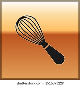 Black Kitchen whisk icon isolated on gold background. Cooking utensil, egg beater. Cutlery sign. Food mix symbol.  Vector Illustration