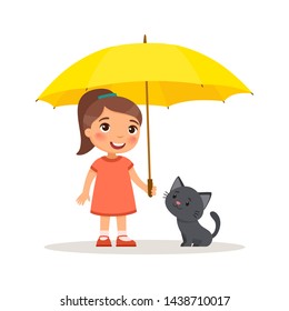 Black kitten and cute little girl with yellow umbrella. Happy school or preschool kid and her pet playing together. 