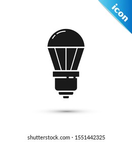 Black LED light bulb icon isolated on white background. Economical LED illuminated lightbulb. Save energy lamp.  Vector Illustration