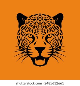 Black leopard head silhouette showing its feline beauty on orange background.