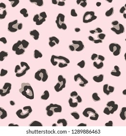 Black leopard or jaguar seamless pattern design on pink background. Trendy fashion fabric design. Vector illustration.